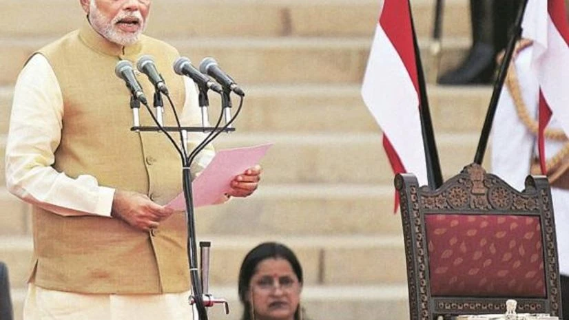 Narendra Modi File photo of Narendra Modi taking oath in 2014.