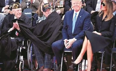 Trump threatens to hike tariffs on China by an additional $300 billion U S President Donald Trump and First Lady Melania Trump at a ceremony to mark the 75th anniversary of the D-Day at the Normandy American Cemetery and Memorial in France on Thursday | Photo: REUTERS