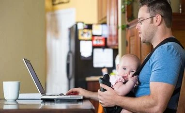 Experts recommend paternity leaves extension to reduce mothers' burden: NCW Paternity leave. Photo: iStock