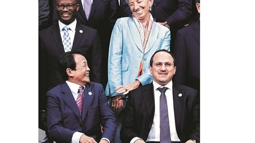 Japan's Finance Minister Taro Aso chats with IMF MD Christine Lagarde in Fukuoka Japan’s Finance Minister Taro Aso chats with IMF MD Christine Lagarde in Fukuoka