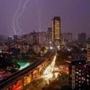 Bolts of lightning flash across the sky during thunderstorm and rain in Thane, Mumbai. Photo: PTI