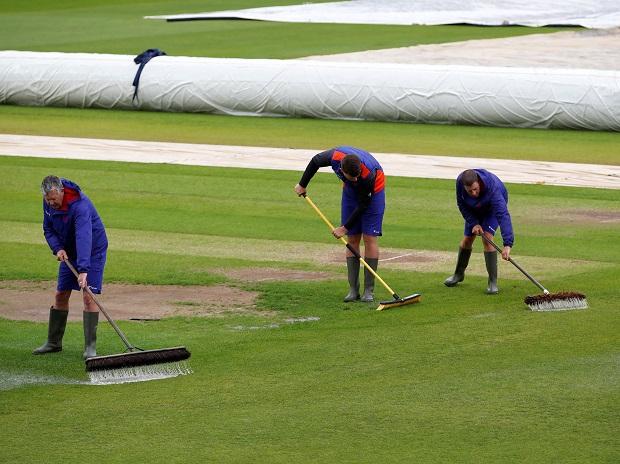 Ground staff prepare the pitch Ground staff prepare the pitch