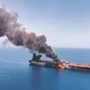 An oil tanker after being attacked near the Strait of Hormuz, on Thursday.  Crude oil prices had shot up briefly after the incident	Photo: Reuters