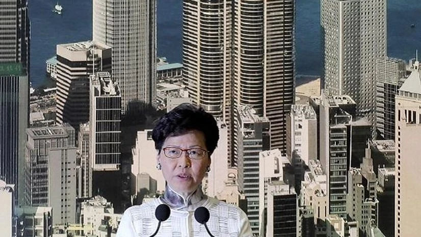 Hong Kong: Hong Kong's Chief Executive Carrie Lam arrives holds a press conference in Hong Kong on Saturday, June 15, 2019. Lam said she will suspend a proposed extradition bill indefinitely in response to widespread public unhappiness over the measu Hong Kong: Hong Kong's Chief Executive Carrie Lam arrives holds a press conference in Hong Kong on Saturday, June 15, 2019. Lam said she will suspend a proposed extradition bill indefinitely in response to widespread public unhappiness over the measu