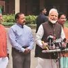 PM Narendra Modi addresses the media before the first sitting of the 17th Lok Sabha on Monday. He was accompanied by  Union Parliamentary Affairs Minister Pralhad Joshi (right), MoS Parliamentary Affairs Arjun Ram Meghwal (left)