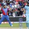 File photo: Afghanistan's captain Gulbadin Naib, left, celebrates the dismissal of England's Jonny Bairstow