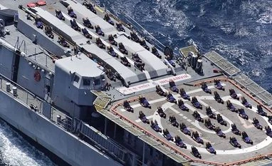 Let's get real Indian Navy personnel perform Yoga on the deck of Indian Navy Ship (INS) Ranvir ahead of the International Day of Yoga 2019, in the Bay of Bengal