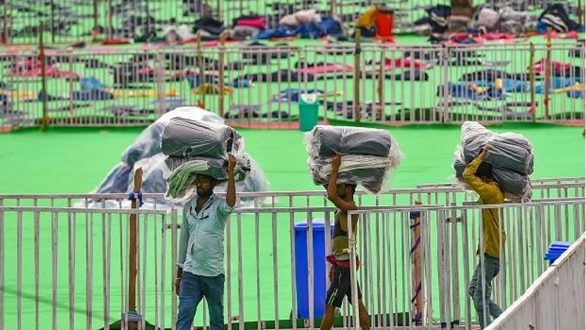 Ranchi: Workers carry yoga mats in preparation at the venue of 5th International Yoga Day, in Ranchi, Thursday, June 20, 2019. Prime Minister Narendra Modi will be joining the programme in the city on Friday.| PTI Photo Ranchi: Workers carry yoga mats in preparation at the venue of 5th International Yoga Day, in Ranchi, Thursday, June 20, 2019. Prime Minister Narendra Modi will be joining the programme in the city on Friday.| PTI Photo