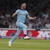 England's Mark Wood celebrates after taking the wicket of Australia's Glenn Maxwell caught behind