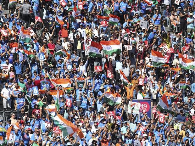Indian supporters celebrate a boundary at Old Trafford in Manchester, England Indian supporters celebrate a boundary at Old Trafford in Manchester, England