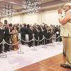 Prime Minister Narendra Modi greets the Indian community at a function in Kobe, Japan, on Thursday 	Photo: PTI