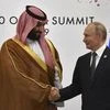 Putin says Russia and Saudi Arabia will maintain oil cuts for 6-9 months