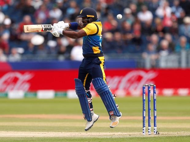Sri Lanka skipper Dimuth Karunaratne plays a shot during a match against West Indies Sri Lanka skipper Dimuth Karunaratne plays a shot during a match against West Indies