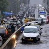 Vehicles move slowly through waterlogged streets during heavy monsoon rain, in Mumbai. BS photo by Kamlesh Pednekar