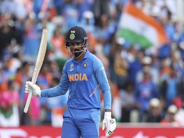 India's K.L. Rahul raises his bat to celebrate scoring fifty runs India's K.L. Rahul raises his bat to celebrate scoring fifty runs