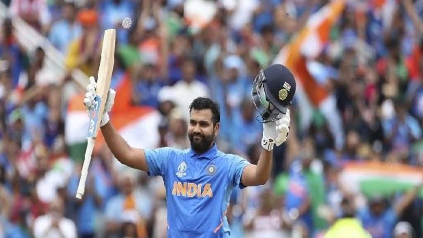Birmingham: India's Rohit Sharma raises his bat and helmet to celebrate scoring a century during the Cricket World Cup match between Bangladesh and India at Edgbaston in Birmingham, England, Tuesday, July 2, 2019. AP/PTI Birmingham: India's Rohit Sharma raises his bat and helmet to celebrate scoring a century during the Cricket World Cup match between Bangladesh and India at Edgbaston in Birmingham, England, Tuesday, July 2, 2019. AP/PTI