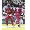 West Indies' Evin Lewis, left, and Shai Hope bats