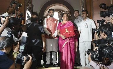 Budget focuses on production and Make in India, not lowering pollution Finance Minister Nirmala Sitharaman and MoS Anurag Thakur arrive at Parliament to present the Union Budget 2019-20 | Photo: PTI