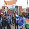 Indian supporters cheer for their team before the start of the Cricket World Cup semi-final match