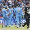 India's Ravindra Jadeja, third left,, celebrates with teammates the dismissal of New Zealand's Henry Nicholls