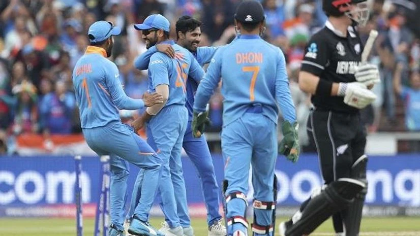 India's Ravindra Jadeja, third left,, celebrates with teammates the dismissal of New Zealand's Henry Nicholls India's Ravindra Jadeja, third left,, celebrates with teammates the dismissal of New Zealand's Henry Nicholls