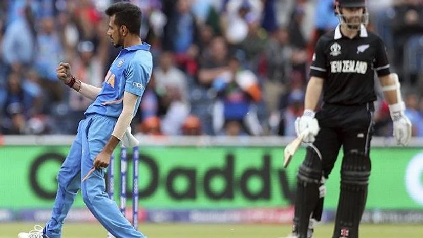 File photo: India's Yuzvendra Chahal, left, celebrates the dismissal of New Zealand's captain Kane Williamson, right, during the Cricket World Cup semi-final match between India and New Zealand at Old Trafford in Manchester, England, Tuesday, July 9 File photo: India's Yuzvendra Chahal, left, celebrates the dismissal of New Zealand's captain Kane Williamson, right, during the Cricket World Cup semi-final match between India and New Zealand at Old Trafford in Manchester, England, Tuesday, July 9
