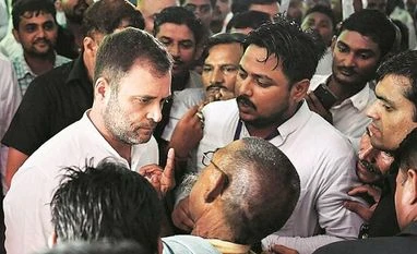 Rahul urged to continue as chief, final decision today, says Surjewala Congress leader Rahul Gandhi listens to a party worker during his visit to Amethi on Wednesday | Photo: PTI