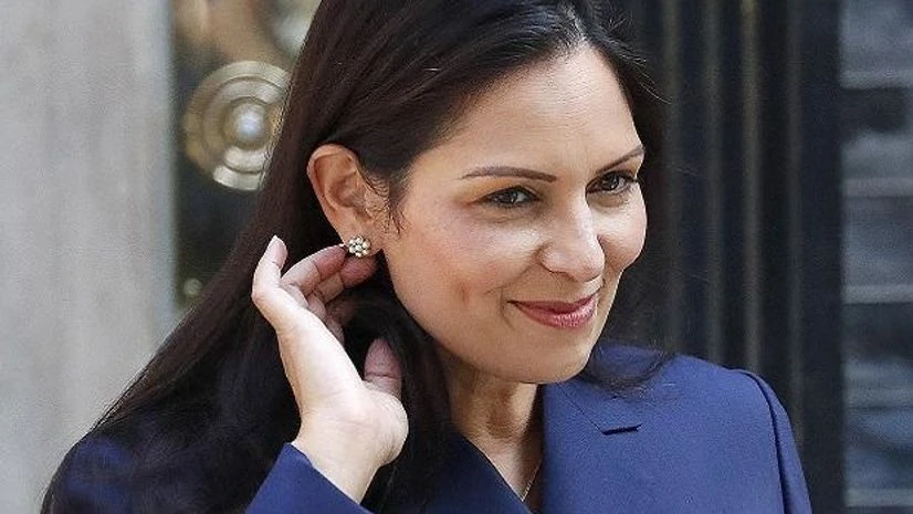 London: Britain's Home Office Secretary Priti Patel leaves after a Cabinet meeting at 10 Downing Street in London, Thursday, July 25, 2019. Newly installed Prime Minister Boris Johnson held his first Cabinet meeting Thursday, replacing many members London: Britain's Home Office Secretary Priti Patel leaves after a Cabinet meeting at 10 Downing Street in London, Thursday, July 25, 2019. Newly installed Prime Minister Boris Johnson held his first Cabinet meeting Thursday, replacing many members