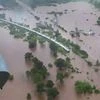 A birds eye view shows Mahalaxmi Express bound for Kohlapur from Mumbai stranded following heavy monsoon rain near Badlapur in Thane district | Photo: PTI