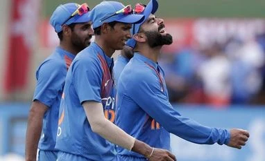 India may experiment with line-up in final T20 against Windies, hints Kohli Virat Kohli with Bhuvneshwar Kumar and Navdeep Saini after winning the first T20I against West Indies