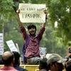 Activists of AISA, CPI(M) and other organizations display placards during a protest against the Union government's move to revoke Article 370 in Jammu Kashmir, in New Delhi (Photo- Dalip Kumar)