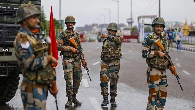 Jammu and Kashmir, Army personnel Army personnel stand guard during restrictions, in Jammu, Monday, Aug 05, 2019 (Photo: PTI)