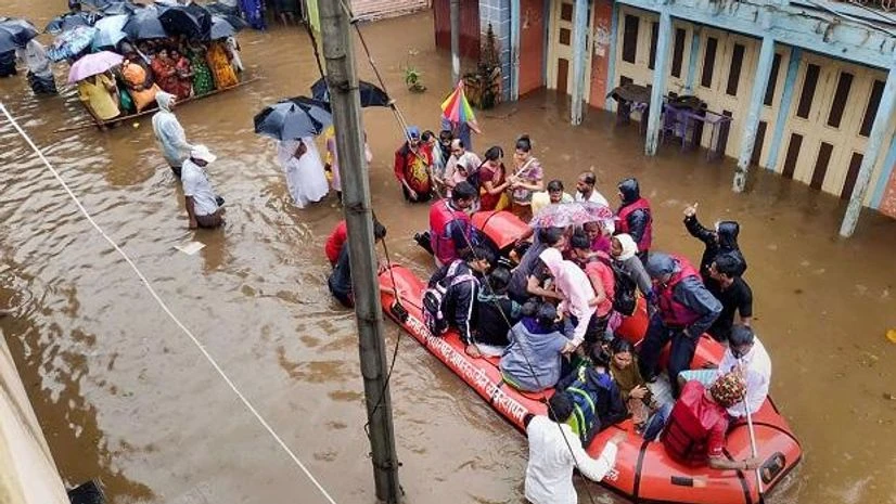 National Disaster Response Force (NDRF) conducts a rescue operation at a flooded area of Tambve village in Karad National Disaster Response Force (NDRF) conducts a rescue operation at a flooded area of Tambve village in Karad