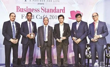 BS Fund Cafe: One misstep can set MF industry back by 10 yrs, says UK Sinha Former Sebi chairman and chief guest U K Sinha (third from left) with BS Fund Managers of the Year - (from left) HDFC MF's Prashant Jain (Large-cap Equity), Franklin Templeton's Anand Radhakrishnan (on behalf of Multi-cap Equity Winner Roshi Jain), A
