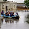 A rescue team moves through the water during coordinated relief and rescue operations by Army Forces in flood-affected areas of Masaguppi village in Belgaum district