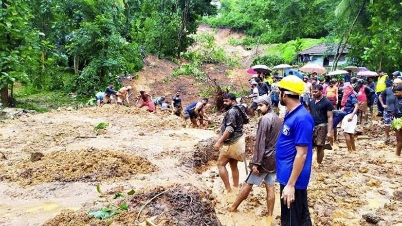 Malappuram: Rescue operation underway at an area affected by landslide due to heavy rain, in Malappuram district, Saturday, August 10, 2019. Photo: PTI Malappuram: Rescue operation underway at an area affected by landslide due to heavy rain, in Malappuram district, Saturday, August 10, 2019. Photo: PTI