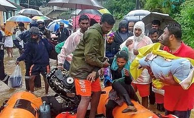 Kodagu: NDRF personnel conduct rescue operations at a flooded area following heavy rain, in Kodagu, Sunday, Aug 11, 2019. (Twitter/PTI Photo) Kodagu: NDRF personnel conduct rescue operations at a flooded area following heavy rain, in Kodagu, Sunday, Aug 11, 2019. (Twitter/PTI Photo)