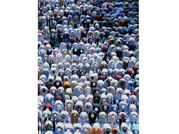 The faithful offer prayers at Machkhowa Eidgah, in Guwahati The faithful offer prayers at Machkhowa Eidgah, in Guwahati