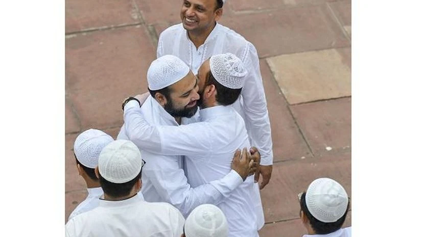 Muslims greet each other on the occasion of Eid al-Adha at Jama Masjid, in New Delhi Muslims greet each other on the occasion of Eid al-Adha at Jama Masjid, in New Delhi
