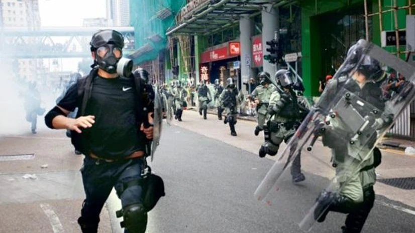 Riot police chase protesters Riot police chase protesters