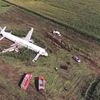 Plane lands belly down in cornfield | Photo: AP/PTI