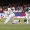 England's Jonny Bairstow plays a shot off the bowling of Australia's Nathan Lyon during the second day of the second Ashes test match between England and Australia at Lord's cricket ground in London. File Photo: AP/PTI