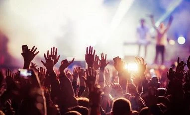 Average internet user spends 21.5 hours every week listening to music concert, music festival