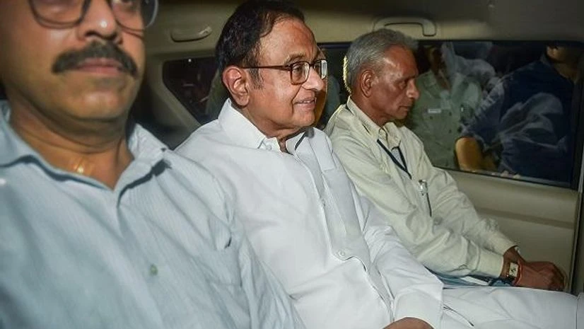 CBI officials arrest Congress leader P Chidambaram from his Jor Bagh residence in New Delhi on Wednesday | Photo: PTI CBI officials arrest Congress leader P Chidambaram from his Jor Bagh residence in New Delhi on Wednesday | Photo: PTI