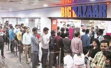E-commerce giant Amazon buys 49% stake in Kishore Biyani's Future Coupons BigBazaar, Future Group, Future Retail