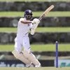 India's Ajinkya Rahane plays a shot against West Indies during day one of the first Test cricket match at the Sir Vivian Richards cricket ground in North Sound. Photo: AP/PTI
