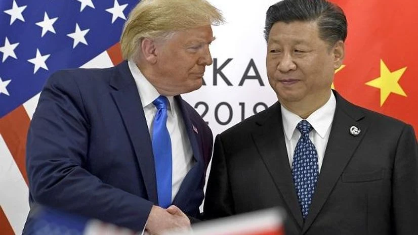 File Photo: U.S. President Donald Trump, left, shakes hands with Chinese President Xi Jinping during a meeting of the G-20 summit Trump, Xi Jinping