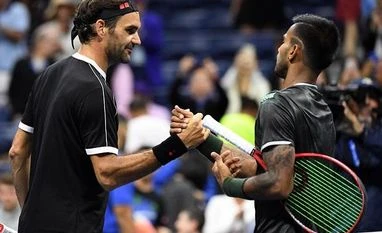 After a scare from Sumit Nagal, Federer predicts a 'solid career' for him Roger Federer and Sumit Nagal after the match. Photo: Reuters