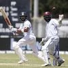 India's captain Virat Kohli that West Indies' wicket keeper Jahmar Hamilton can't catch during day one of the second Test cricket match at Sabina Park cricket ground in Kingston, Jamaica. Photo: AP/PTI