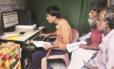 Assam govt to set up 200 foreigners' tribunals for people excluded from NRC People checking their names on the final NRC list at a DTP centre of Buraburi Bazar, in Morigaon, Assam Photo: PTI